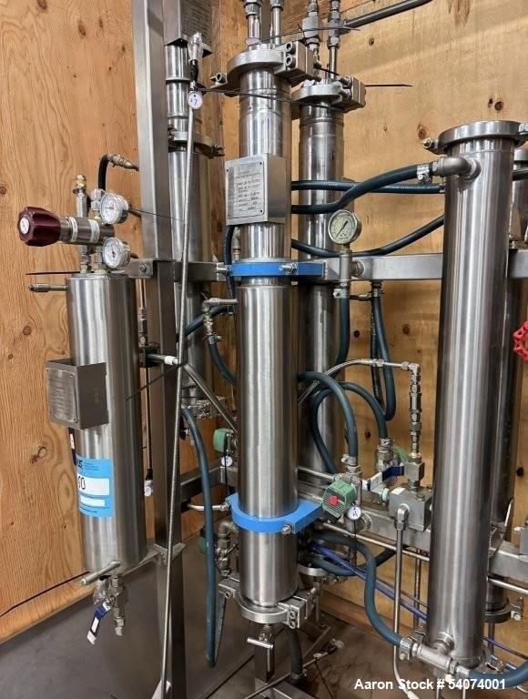 Used Vitalis R-Series CO2 Extraction System. Consisting of: Model R200H Extractor Assembly; Accumulator/Pump & Refrigeration Assembly; Hydraulic Power Unit; Control Panels; Navien Tankless Water Heat...