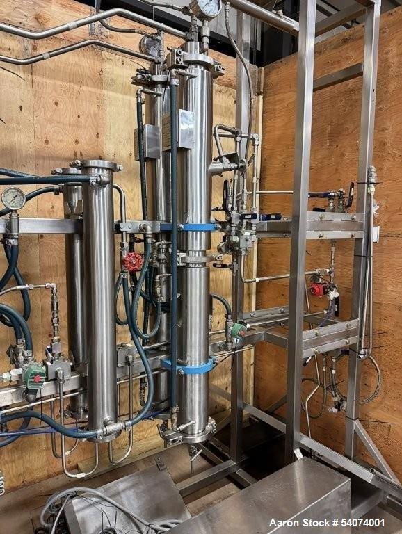 Used Vitalis R-Series CO2 Extraction System. Consisting of: Model R200H Extractor Assembly; Accumulator/Pump & Refrigeration Assembly; Hydraulic Power Unit; Control Panels; Navien Tankless Water Heat...