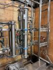 Used Vitalis R-Series CO2 Extraction System. Consisting of: Model R200H Extractor Assembly; Accumulator/Pump & Refrigeration Assembly; Hydraulic Power Unit; Control Panels; Navien Tankless Water Heat...