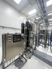Unused Vitalis Extraction System, Model R200H-SS-GMP. (2) 100 L  stainless steel vessels, 35-150 degrees F extraction temperature range, 0-5000psi extraction pressure range. Includes Accumulator/Pump...