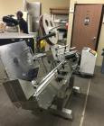 Used Accutek APS-134 Horizontal Wrap Labeler