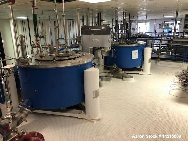 Used Tolhurst Center Slung Top Unload Basket Centrifuge. 48" diameter x 22" high. Stainless steel. Previously used on Marigolds.