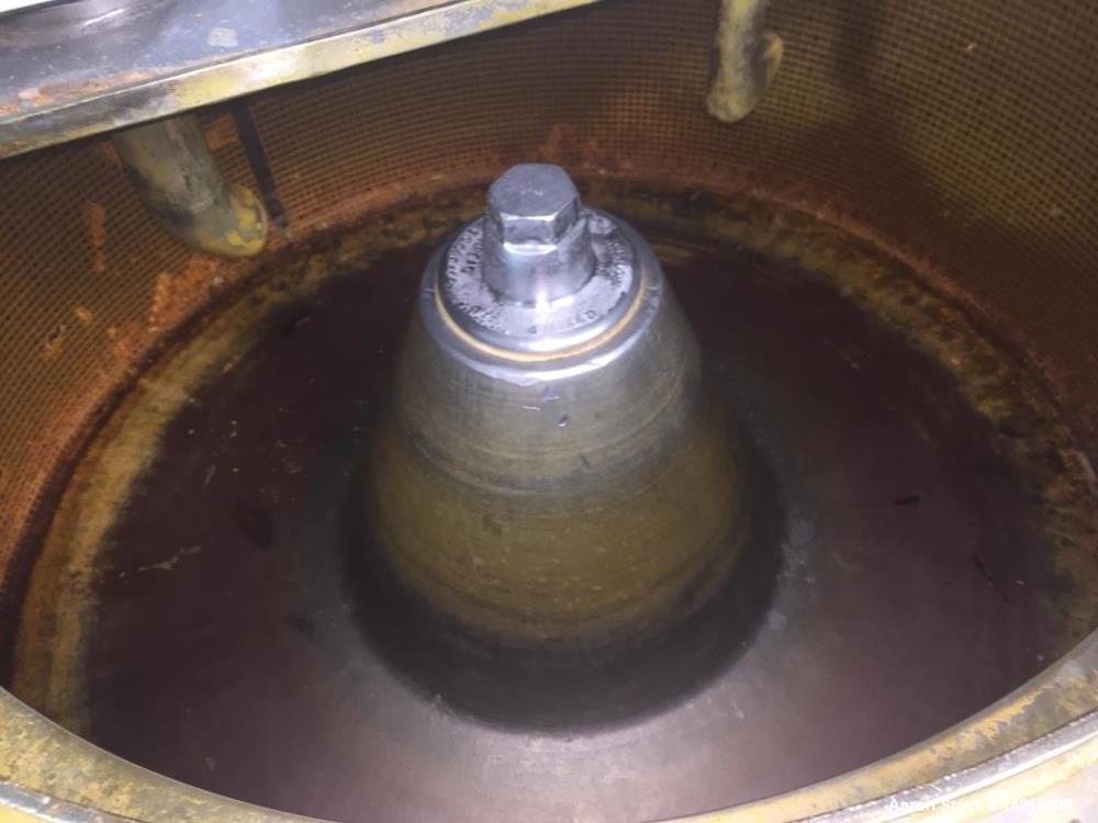 Used Tolhurst Center Slung Top Unload Basket Centrifuge. 48" diameter x 22" high. Stainless steel. Previously used on Marigolds.