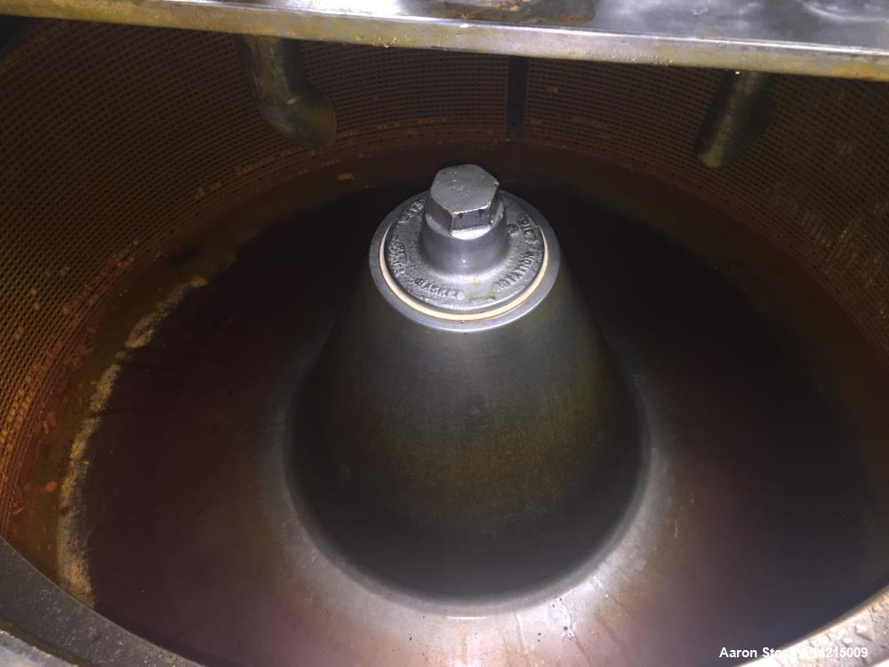 Used Tolhurst Center Slung Top Unload Basket Centrifuge. 48" diameter x 22" high. Stainless steel. Previously used on Marigolds.