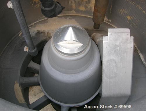 USED: Tolhurst 40" x 24" basket centrifuge, carbon steel/rubber lined. Max bowl speed 1180 rpm. Top load, bottom dump, tripo...