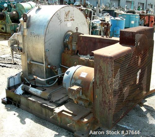 USED: Baker Perkins peeler centrifuge, model HS-36. 304 stainless steel product contact areas. 36" diameter x 12-3/4" deep perforated bowl, max speed 1300 rpm. Approximately 4.15 cubic foot capacity....
