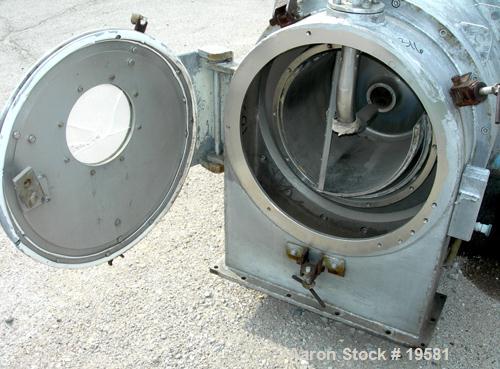 USED: Krupp-Dolberb SB-400 pusher centrifuge, 316 stainless steel product contact areas. 2000 rpm, single stage. 15 hp, 3/60/550 volt, 1800 rpm drive motor; 15 hp, 3/60/550 volt hydraulic pusher moto...