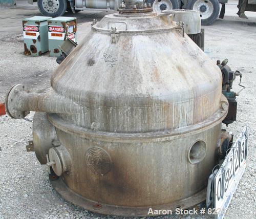 USED: Dorr Oliver/Mercone C-400 Screening Centrifuge. 316 stainless steel construction on product contact areas, 2400 rpm bowl speed, helix scroll for solids discharge, feed pipe, base, casing. Drive...