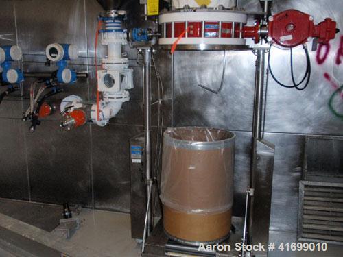 Used Heinkel Centrifuge, Model HF600-1, Hastelloy C22 (product contact sufaces). Rated 571/65 KG load. Includes drum lifting system and control panels. Built 2002.