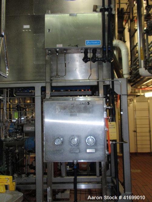 Used Heinkel Centrifuge, Model HF600-1, Hastelloy C22 (product contact sufaces). Rated 571/65 KG load. Includes drum lifting system and control panels. Built 2002.