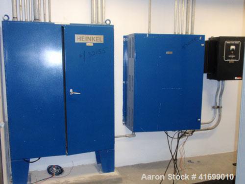 Used Heinkel Centrifuge, Model HF600-1, Hastelloy C22 (product contact sufaces). Rated 571/65 KG load. Includes drum lifting system and control panels. Built 2002.