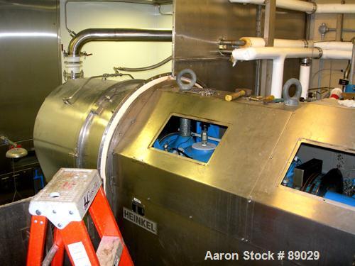 USED: Heinkel model HF800.1 inverting filter centrifuge. Wetted parts Hastelloy C22. 800 mm bowl, max bowl speed 1600 rpm. Approximate drum capacity 149 kg/119 L. Driven by a 40 hp motor. Built 1992....