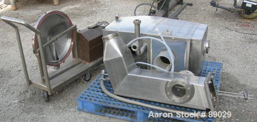 USED: Heinkel model HF800.1 inverting filter centrifuge. Wetted parts Hastelloy C22. 800 mm bowl, max bowl speed 1600 rpm. Approximate drum capacity 149 kg/119 L. Driven by a 40 hp motor. Built 1992....