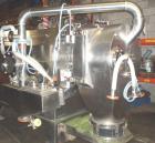 Used Heinkel Inverting Centrifuge, Model HF600. 316 stainless steel, pharmaceutical grade finish. Max bowl speed 1936 rpm. Driven by a 40 hp, 3/60/460 volt, 1765 rpm XP motor. Bowl dimensions are 23....