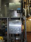 Used Heinkel Centrifuge, Model HF600-1, Hastelloy C22 (product contact sufaces). Rated 571/65 KG load. Includes drum lifting system and control panels. Built 2002.