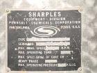 USED: Sharples M-210 Conejector screening centrifuge. 316 stainless steel, gearbox, torque arm assembly, casing, rinse fitting, drive motor, 220/440/3/60, 1.25 hp lubrication pump, control. Mounted o...