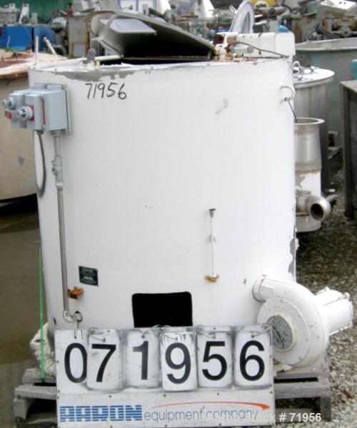 USED: Barrett washer dryer centrifuge, model WDS. Stainless steel. Approximately 36" diameter x 14" deep. Top door with sightglass. Rated approx 15 loads per hour at 250 pounds per load. 900 rpm. Dir...