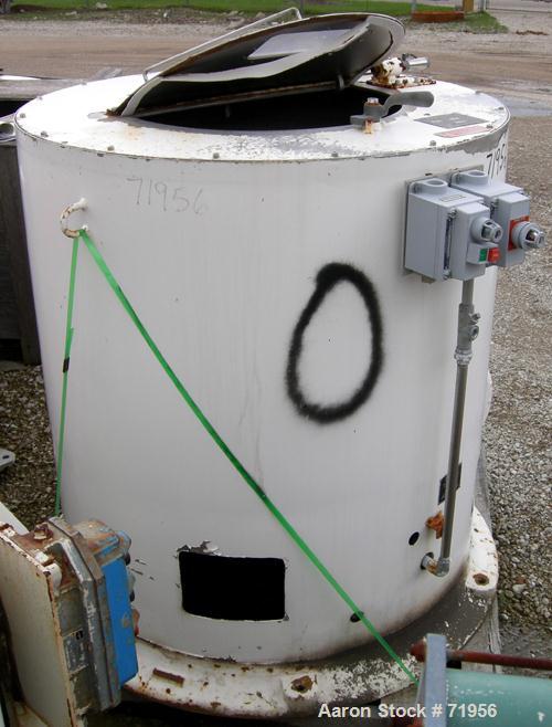 USED: Barrett washer dryer centrifuge, model WDS. Stainless steel. Approximately 36" diameter x 14" deep. Top door with sightglass. Rated approx 15 loads per hour at 250 pounds per load. 900 rpm. Dir...