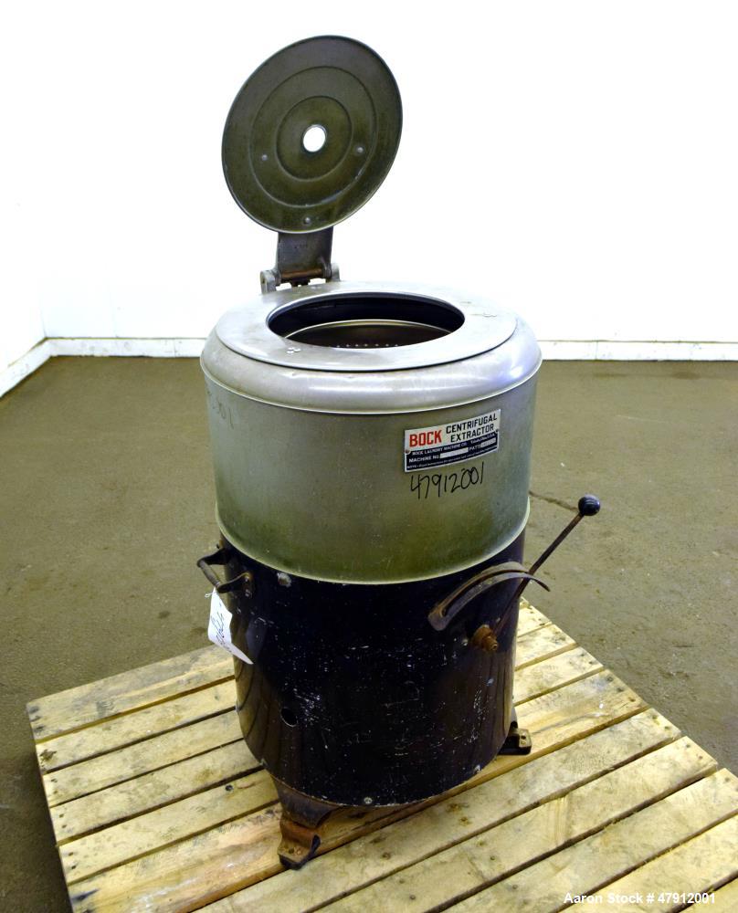 Used Bock Centrifugal Extractor, Model 24-B-C. 17" Diameter x 9" deep Alloy 400 perforated basket. 15 Pound dry capacity, top load & unload. Includes a top cover, and a manual brake. Driven by an app...