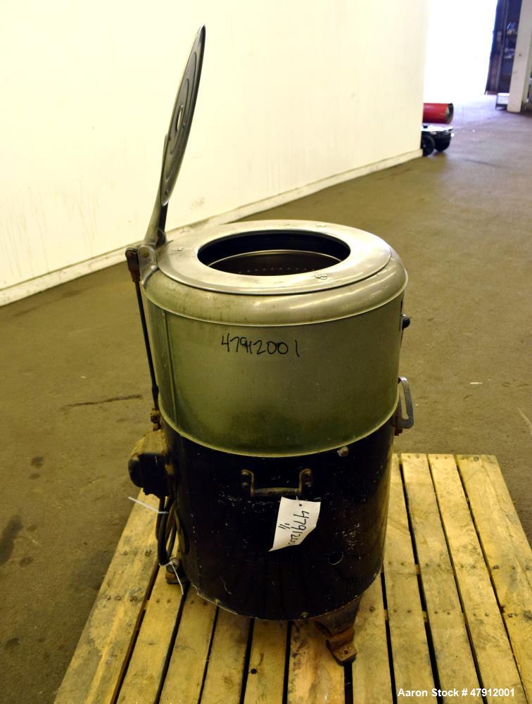 Used Bock Centrifugal Extractor, Model 24-B-C. 17" Diameter x 9" deep Alloy 400 perforated basket. 15 Pound dry capacity, top load & unload. Includes a top cover, and a manual brake. Driven by an app...
