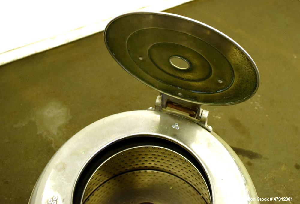 Used Bock Centrifugal Extractor, Model 24-B-C. 17" Diameter x 9" deep Alloy 400 perforated basket. 15 Pound dry capacity, top load & unload. Includes a top cover, and a manual brake. Driven by an app...