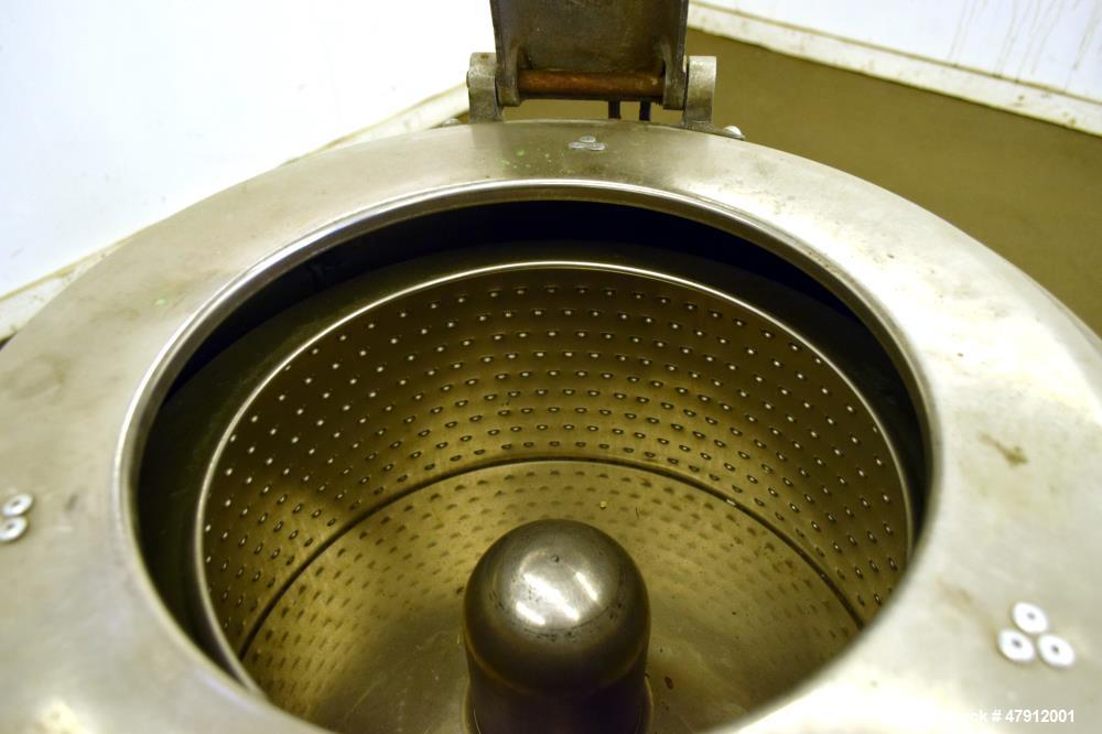 Used Bock Centrifugal Extractor, Model 24-B-C. 17" Diameter x 9" deep Alloy 400 perforated basket. 15 Pound dry capacity, top load & unload. Includes a top cover, and a manual brake. Driven by an app...