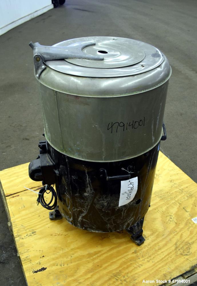 Used Bock Centrifugal Extractor, Model 24-BC. 17" Diameter x 9" deep Alloy 400 perforated basket. 15 Pound dry capacity, top load & unload. Includes a top cover, and a manual brake. Driven by an appr...