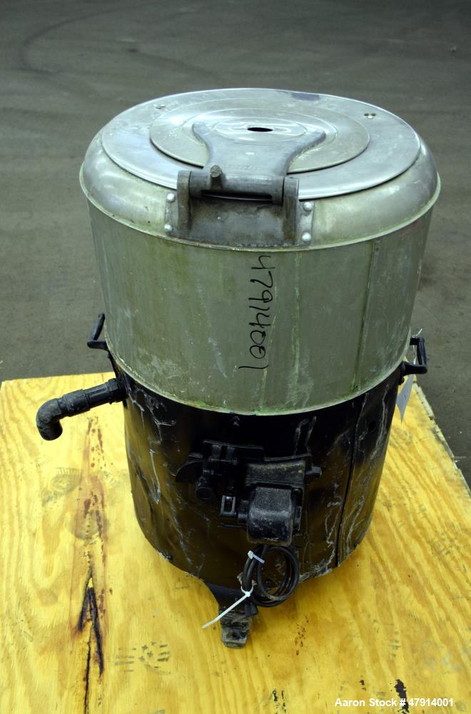 Used Bock Centrifugal Extractor, Model 24-BC. 17" Diameter x 9" deep Alloy 400 perforated basket. 15 Pound dry capacity, top load & unload. Includes a top cover, and a manual brake. Driven by an appr...