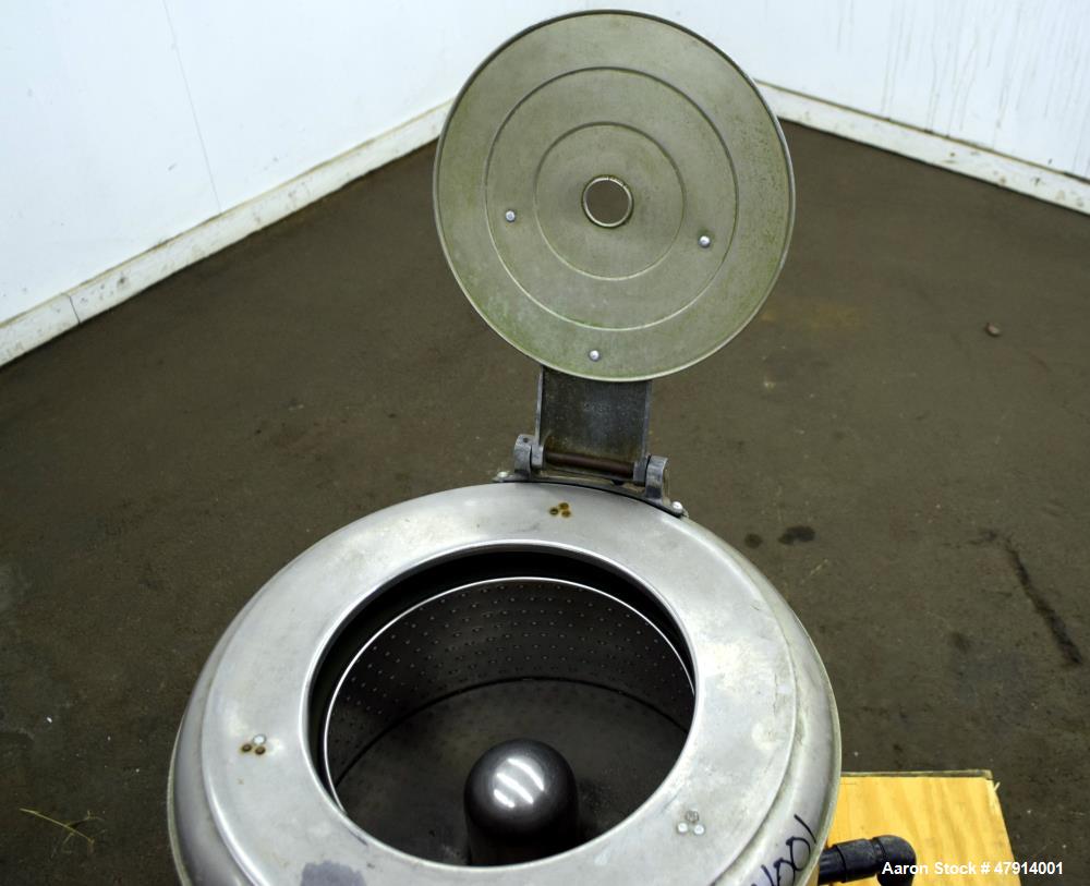 Used Bock Centrifugal Extractor, Model 24-BC. 17" Diameter x 9" deep Alloy 400 perforated basket. 15 Pound dry capacity, top load & unload. Includes a top cover, and a manual brake. Driven by an appr...