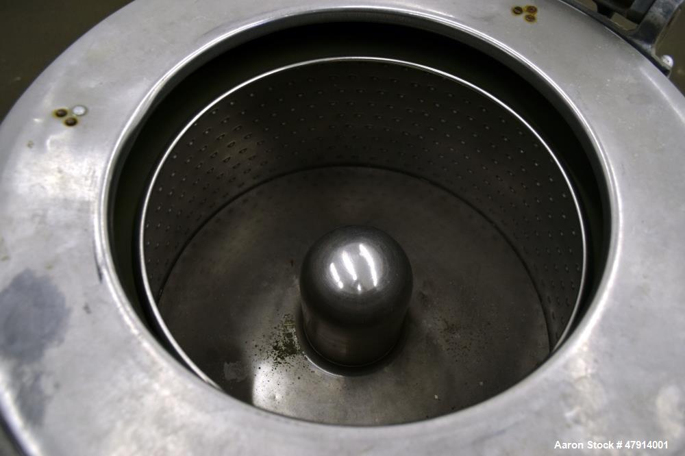 Used Bock Centrifugal Extractor, Model 24-BC. 17" Diameter x 9" deep Alloy 400 perforated basket. 15 Pound dry capacity, top load & unload. Includes a top cover, and a manual brake. Driven by an appr...