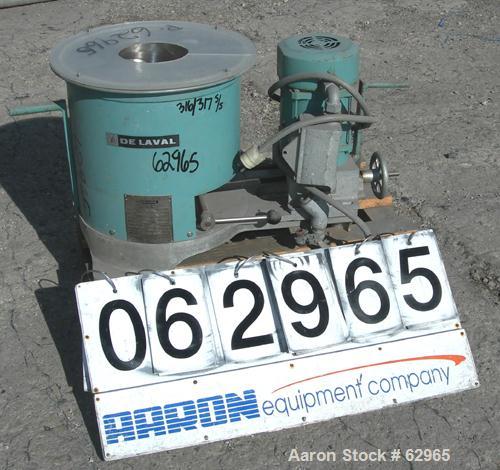 USED: Delaval 8" x 4" perforated basket centrifuge. 316/317 stainless steel construction (product contact areas). Top load/unload, 3300 rpm max basket speed. Plastic top cover, .06 cubic feet max loa...