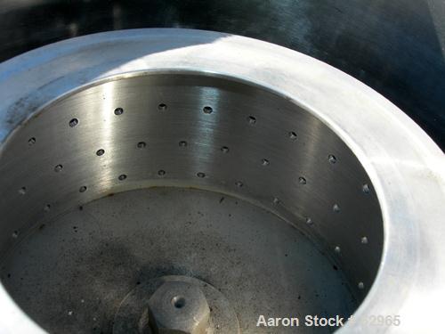 USED: Delaval 8" x 4" perforated basket centrifuge. 316/317 stainless steel construction (product contact areas). Top load/unload, 3300 rpm max basket speed. Plastic top cover, .06 cubic feet max loa...