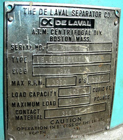 USED: Delaval 8" x 4" perforated basket centrifuge. 316/317 stainless steel construction (product contact areas). Top load/unload, 3300 rpm max basket speed. Plastic top cover, .06 cubic feet max loa...