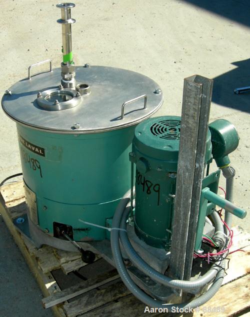 USED: Delaval model BB 12" x 5.5" perforated basket centrifuge, 316 stainless steel product contact areas. Top load/unload. Max bowl speed 3300 rpm, basket rated .2 cubic foot, 50 pound load capacity...
