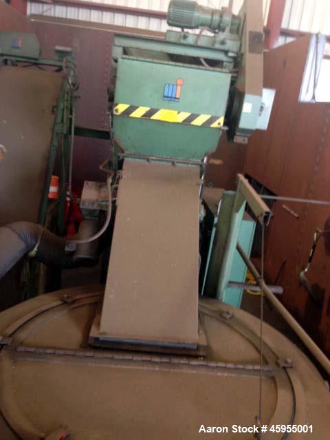 Used Mayfran Chip Wringer System, Model TD 5000. (Chip wringers (or chip centrifuges) dry chips from machining or grinding sludge to recover valuable coolant, and increasing their scrap value. These ...