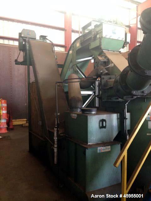 Used Mayfran Chip Wringer System, Model TD 5000. (Chip wringers (or chip centrifuges) dry chips from machining or grinding sludge to recover valuable coolant, and increasing their scrap value. These ...