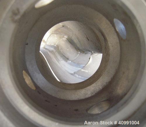 Used Alfa Laval Conveyor, Type NX 418B-31G. 316 stainless steel construction on product contact areas. 70 mm single lead Esjberg with welded hard facing and ribbon flights. 


