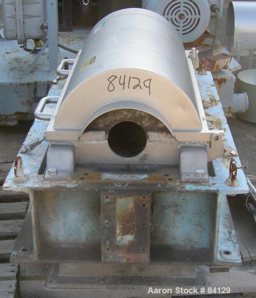 USED: Alfa Laval NX-314B-31 solid bowl decanter base and casing assembly.