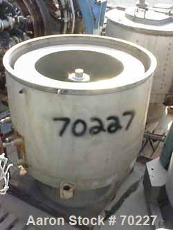 USED: Sharples 48" x 30" tornado perforated basket centrifuge curbhousing with spindle assembly and basket. 316 stainless steelconstruction (product contact areas), top load, bottom unload.Max bowl s...