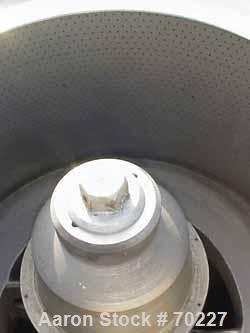 USED: Sharples 48" x 30" tornado perforated basket centrifuge curbhousing with spindle assembly and basket. 316 stainless steelconstruction (product contact areas), top load, bottom unload.Max bowl s...