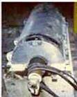USED: Parts for a Sharples P-3400 decanter centrifuge.  Consisting of: (1) bowl extension, circular side discharge ports with ceramic liners (1) cake hub (1) liquid hub, slotted with 1-2-3-4 settings...