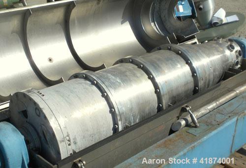 Used Alfa Laval AVNX-418K-31 Solid Bowl Decanter Centrifuge, 316 Stainless Steel Construction (Product Contact Areas), Maximum bowl speed 3250 RPM. Double row of lined cake discharge ports, 70 MM sin...