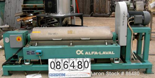 USED: Alfa Laval AVNX-420B-31G solid bowl decanter centrifuge. Max bowl speed 4000 rpm, stainless steel construction on product contact areas, single lead conveyor, single row of lined cake discharge...
