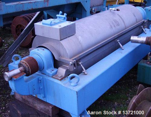 Used Alfa Laval decanter, type AVNX-418B-11G. 316 stainless steel construction on product contact parts. Max bowl speed 3000 rpm. Double row of cake discharge ports, 70 mm single lead conveyor with w...