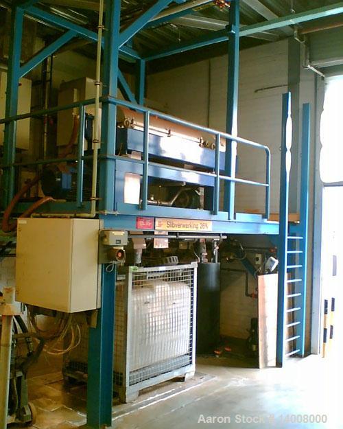 Used Alfa Laval decanter, type NX-418. Material of construction is stainless steel. Complete wtih gearbox, back drive, casing and frame. On 4 legs. Includes control panel.