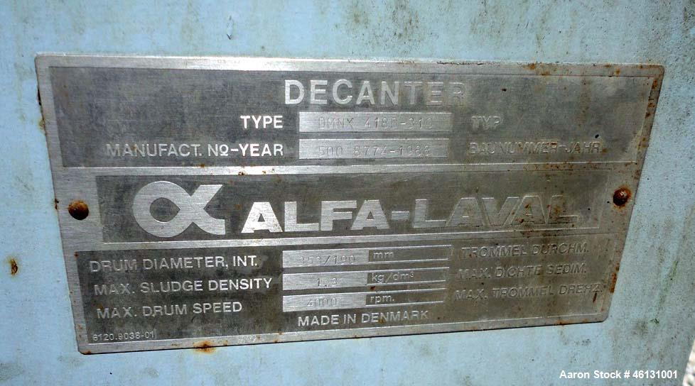 Used Alfa Laval DMNX-418 Solid Bowl Decanter Centrifuge Parts. consisting of misc. bowl components, base, casing.