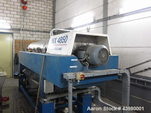 Used Alfa Laval DSNX4850 Decanter Centrifuge. AISI316 (1.4401) Stainless steel construction on product contact parts. Max bowl speed 3650 rpm, 2 phase, 18.8” diameter x 79.4” straight side (480 mm di...