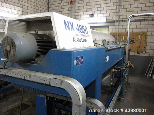 Used Alfa Laval DSNX4850 Decanter Centrifuge. AISI316 (1.4401) Stainless steel construction on product contact parts. Max bowl speed 3650 rpm, 2 phase, 18.8” diameter x 79.4” straight side (480 mm di...