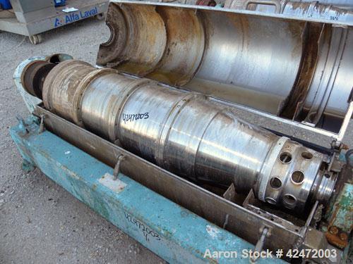 Used Alfa Laval FPNX-418B-31 Solid Bowl Decanter Centrifuge, 316 stainless steel construction (product contact areas), maximum bowl speed 3250 rpm, double row of lined cake discharge ports, 110 mm si...