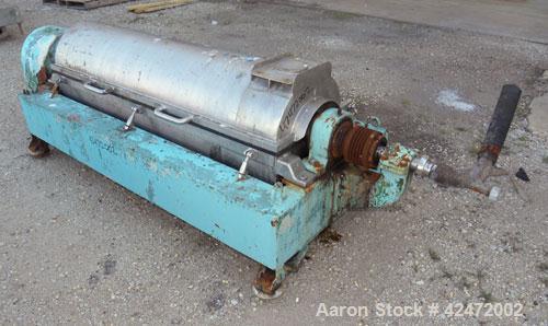 Used Alfa Laval FPNX-418B-31 Solid Bowl Decanter Centrifuge, 316 stainless steel construction (product contact areas), maximum bowl speed 3250 rpm, double row of lined cake discharge ports, 110 mm si...